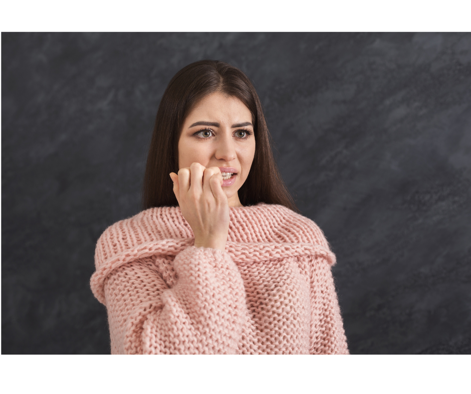 Image of a nervous woman unsure of what she just agreed to. People pleasing image