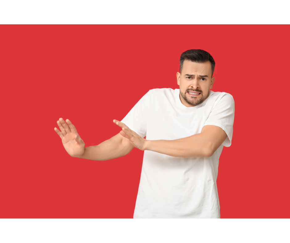 Image of man with his hands out as though he wants no one to touch him. Why Making Friends as an Adult Feels So Difficult