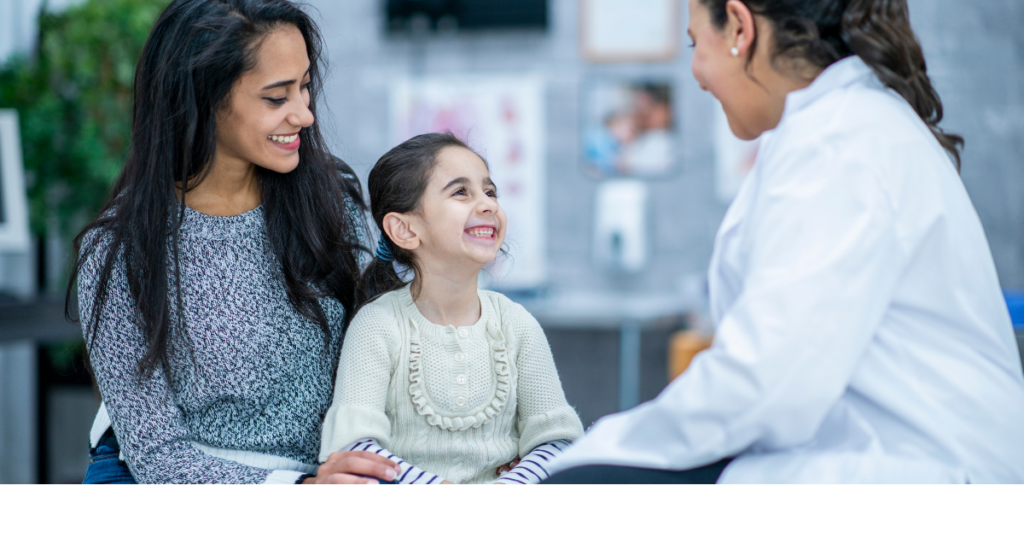 Why Patient and Family Engagement Is Critical in HAI Risk Reduction. Image of young patient and her mother sitting listening to their healthcare provider