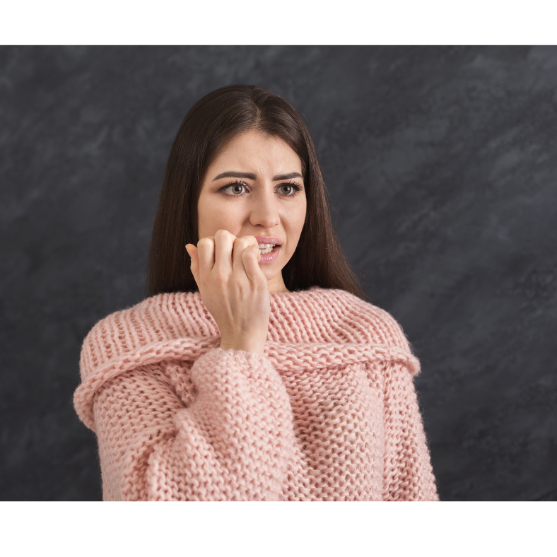 Image of a nervous woman unsure of what she just agreed to. People pleasing image
