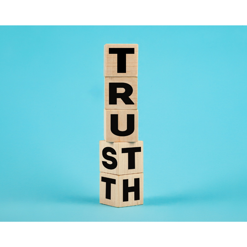 Image of tiles with the letters that spell Trust and Truth. Financial trust in a relationship