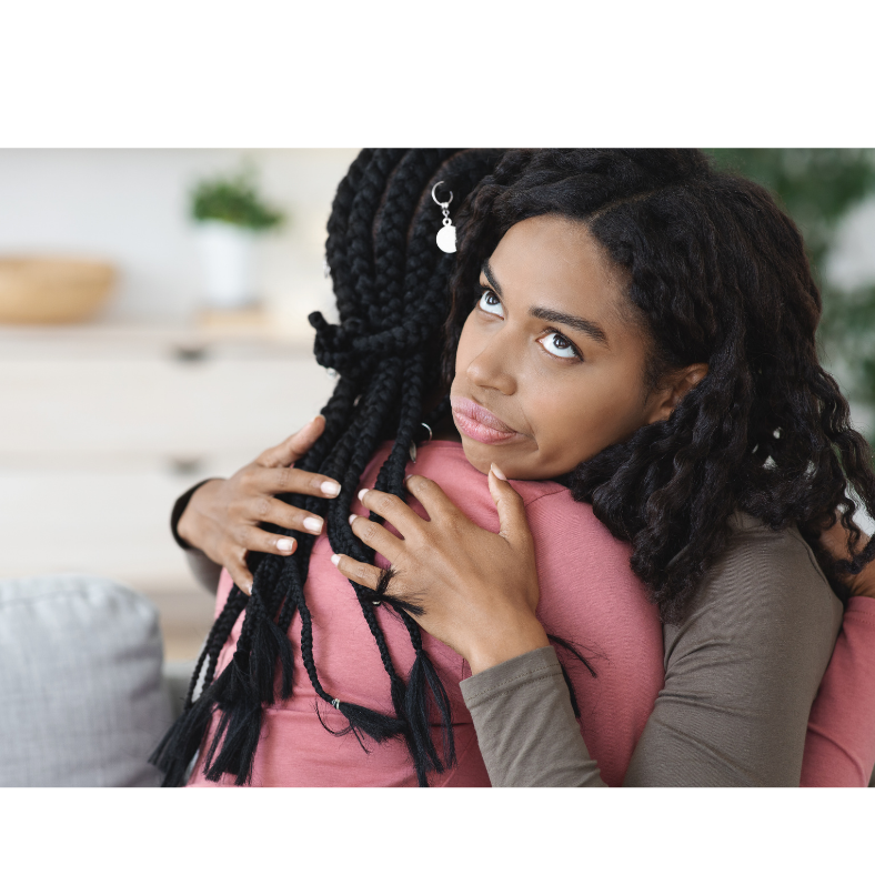 Image of two people hugging but one person doesn't like the hug. Unresolved hurt and guilt